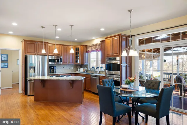 a bedroom with a bed and a dresser in it