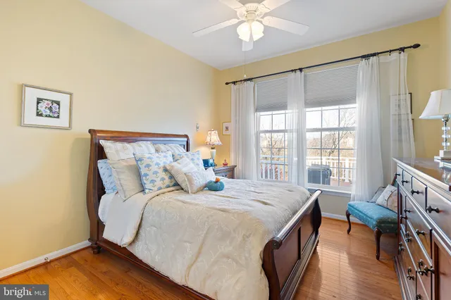 a bed room with a bed and a television