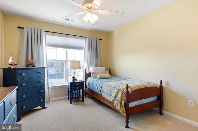 an aerial view of a house with swimming pool