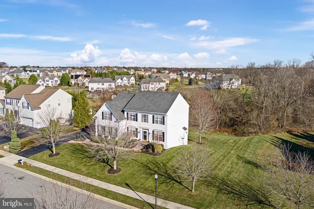 a view of a living room and dining room