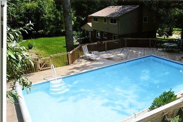670 Canyon Road Rochester, MI 48306 - Photo 20 of 25 Pool & rear of home #2