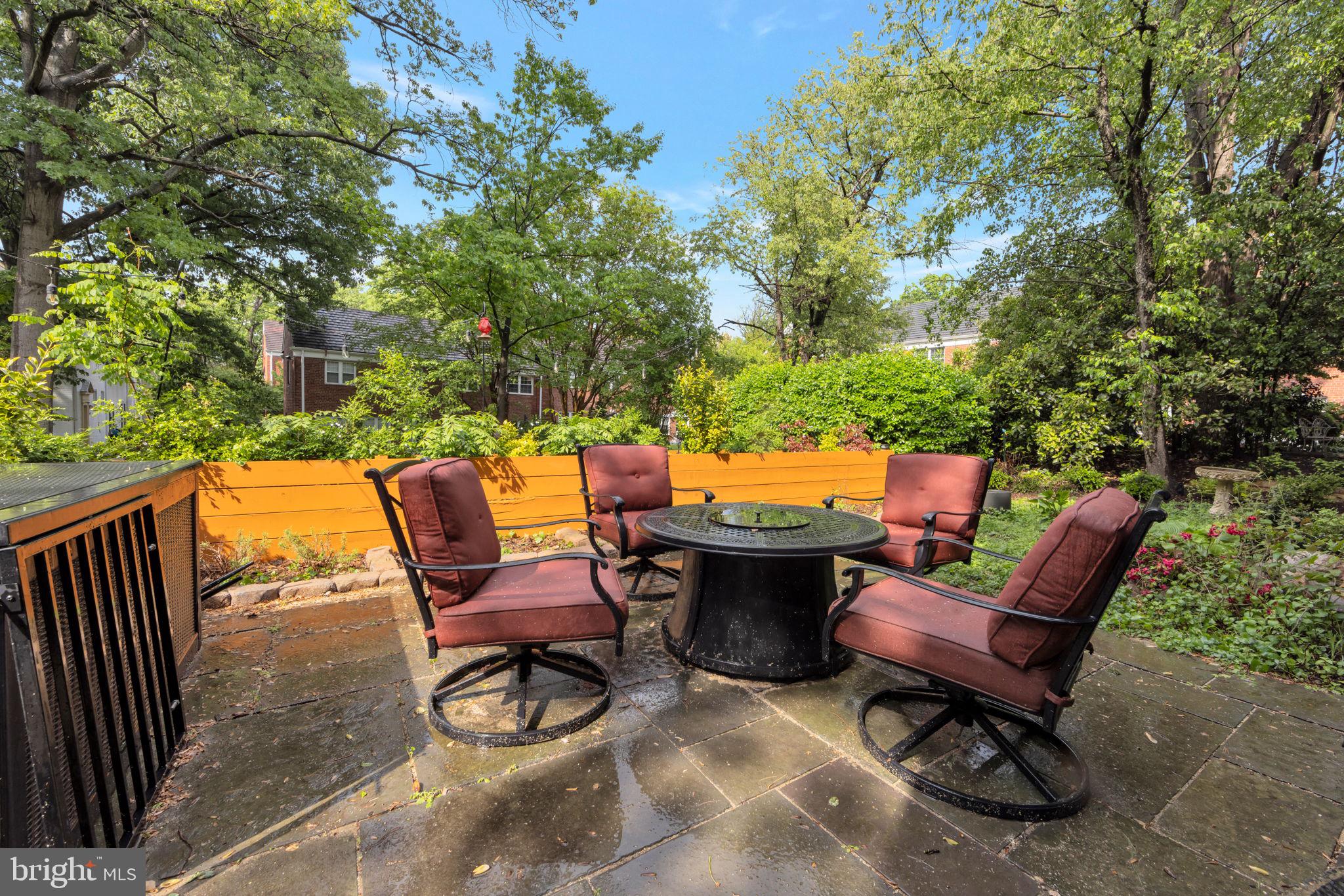 3400 Gunston Road Alexandria, VA 22302 - Photo 13 of 15 Serene garden retreat with seating.