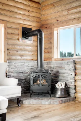 a view of living room kitchen with furniture and window