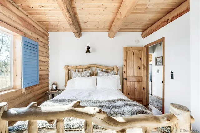 a large white bed in a white room