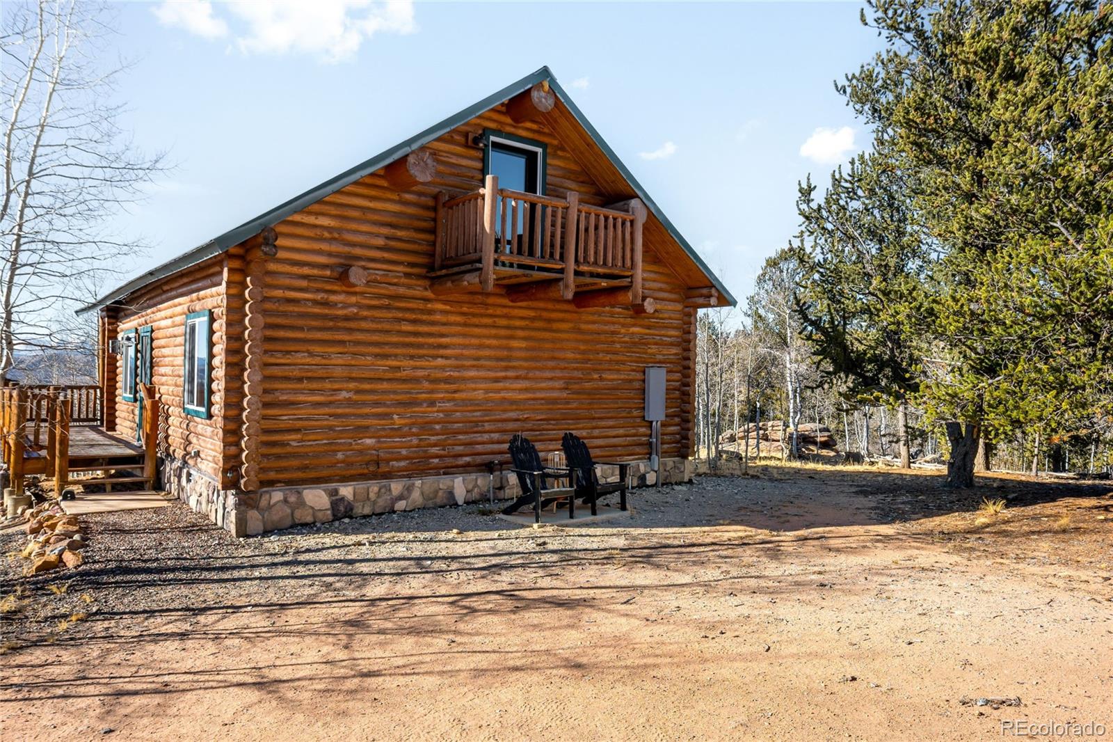 43 Pintail Way Como, CO 80432 - Photo 30 of 48 a view of a house with snow on the road