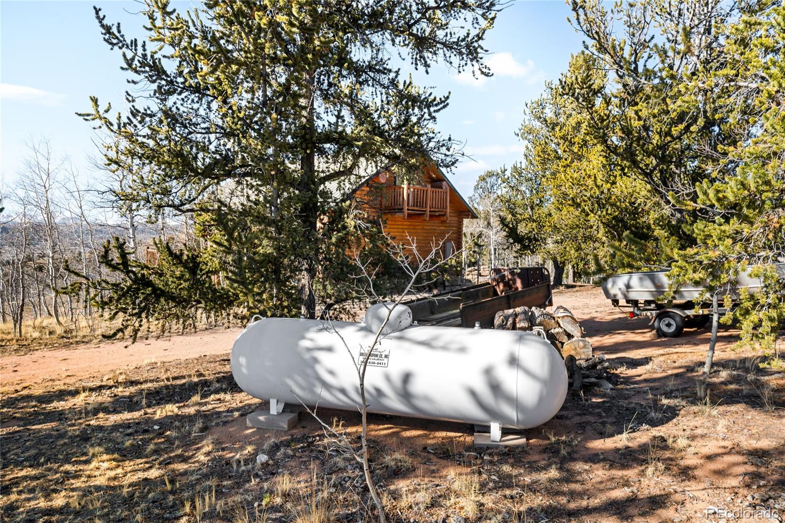 43 Pintail Way Como, CO 80432 - Photo 32 of 48 a view of a swimming pool with a patio