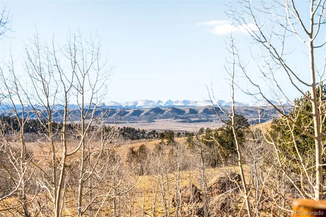 a view of a yard with an ocean