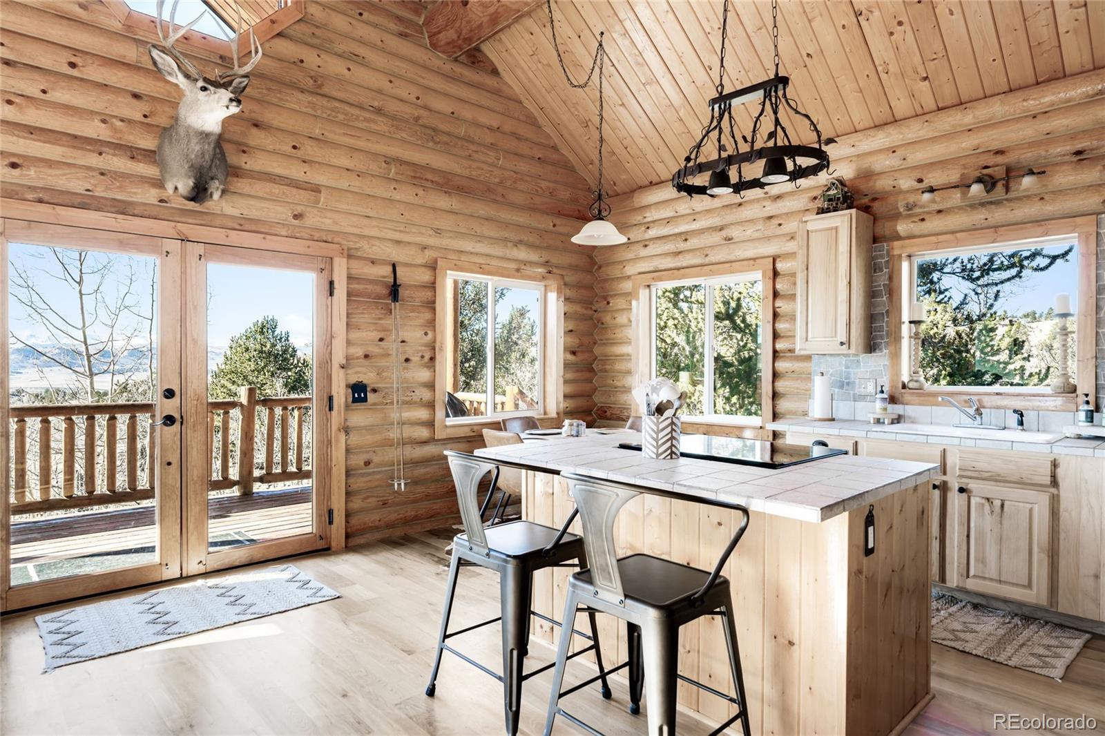 43 Pintail Way Como, CO 80432 - Photo 9 of 48 a view of a dining room with furniture window and outside view