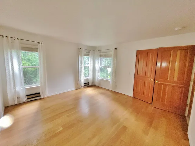 a balcony with lots of trees