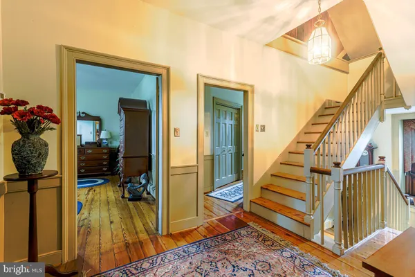 a view of a living room and bathroom