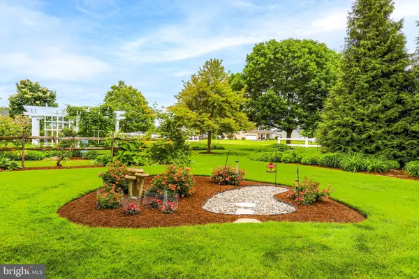 a view of a golf course with a garden