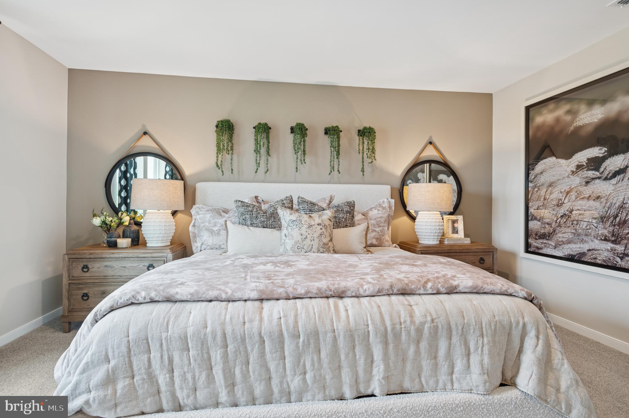 63 Sweetgum Road, Unit 35 Berlin, NJ 08009 - Photo 12 of 38 a bedroom with a bed and dresser with mirror