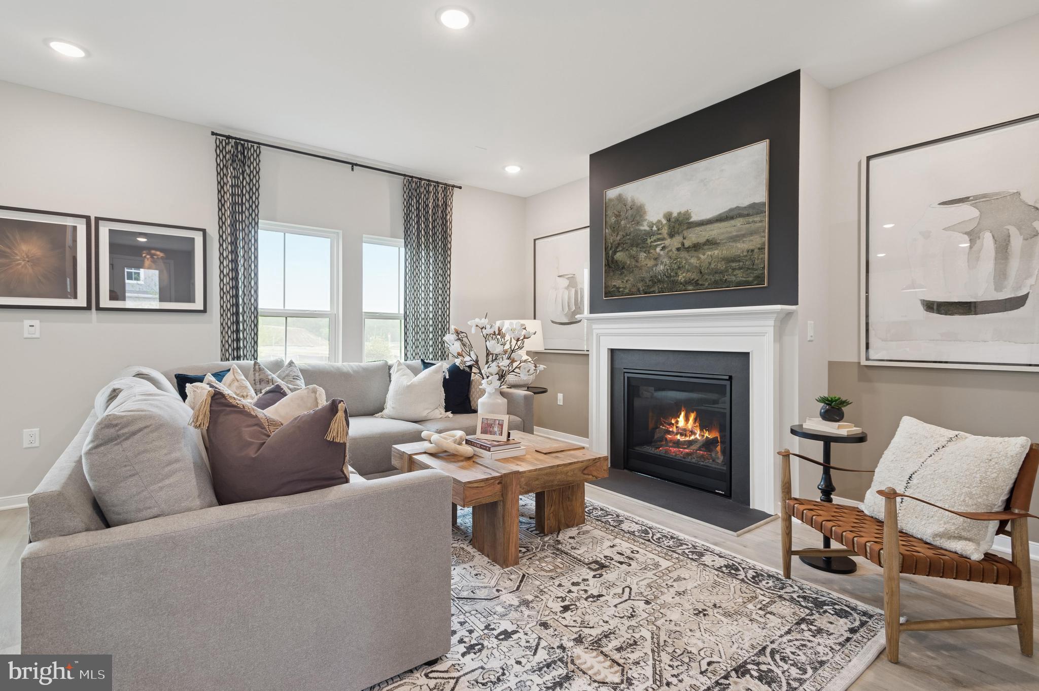 63 Sweetgum Road, Unit 35 Berlin, NJ 08009 - Photo 25 of 38 a living room with furniture a rug and a fireplace
