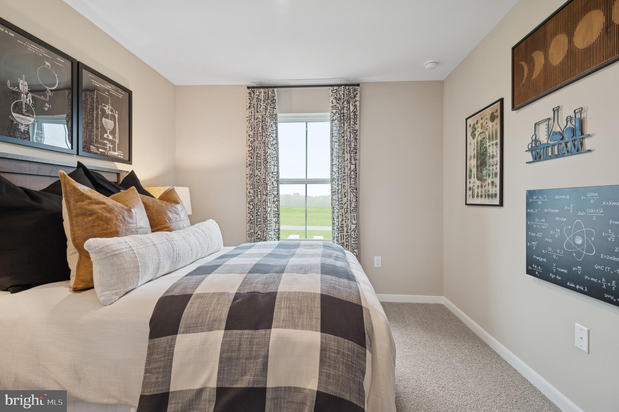 63 Sweetgum Road, Unit 35 Berlin, NJ 08009 - Photo 36 of 38 a bedroom with a bed and painting on the wall