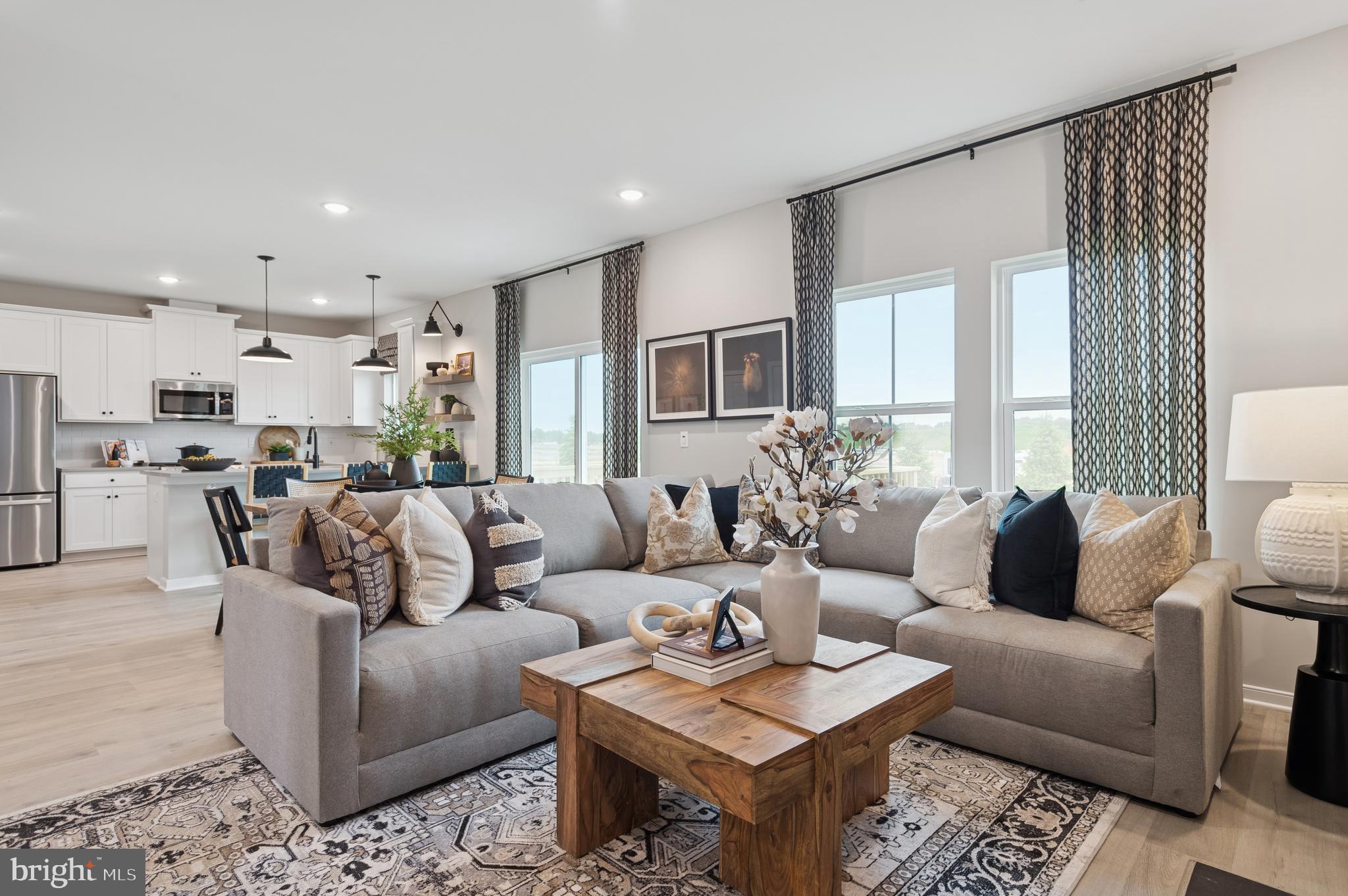 63 Sweetgum Road, Unit 35 Berlin, NJ 08009 - Photo 6 of 38 a living room with furniture kitchen and a table