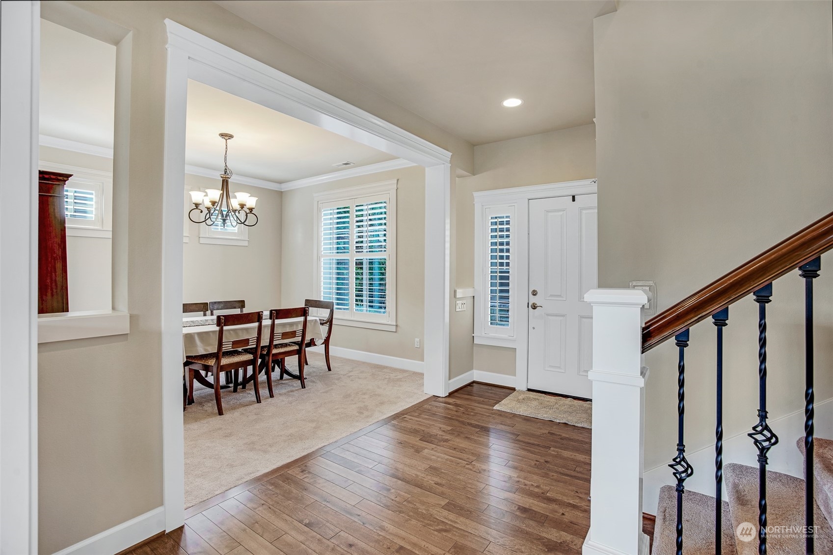 6127 Southeast 2nd Street Renton, WA 98059 - Photo 11 of 33 a view of a dining room with furniture and wooden floor