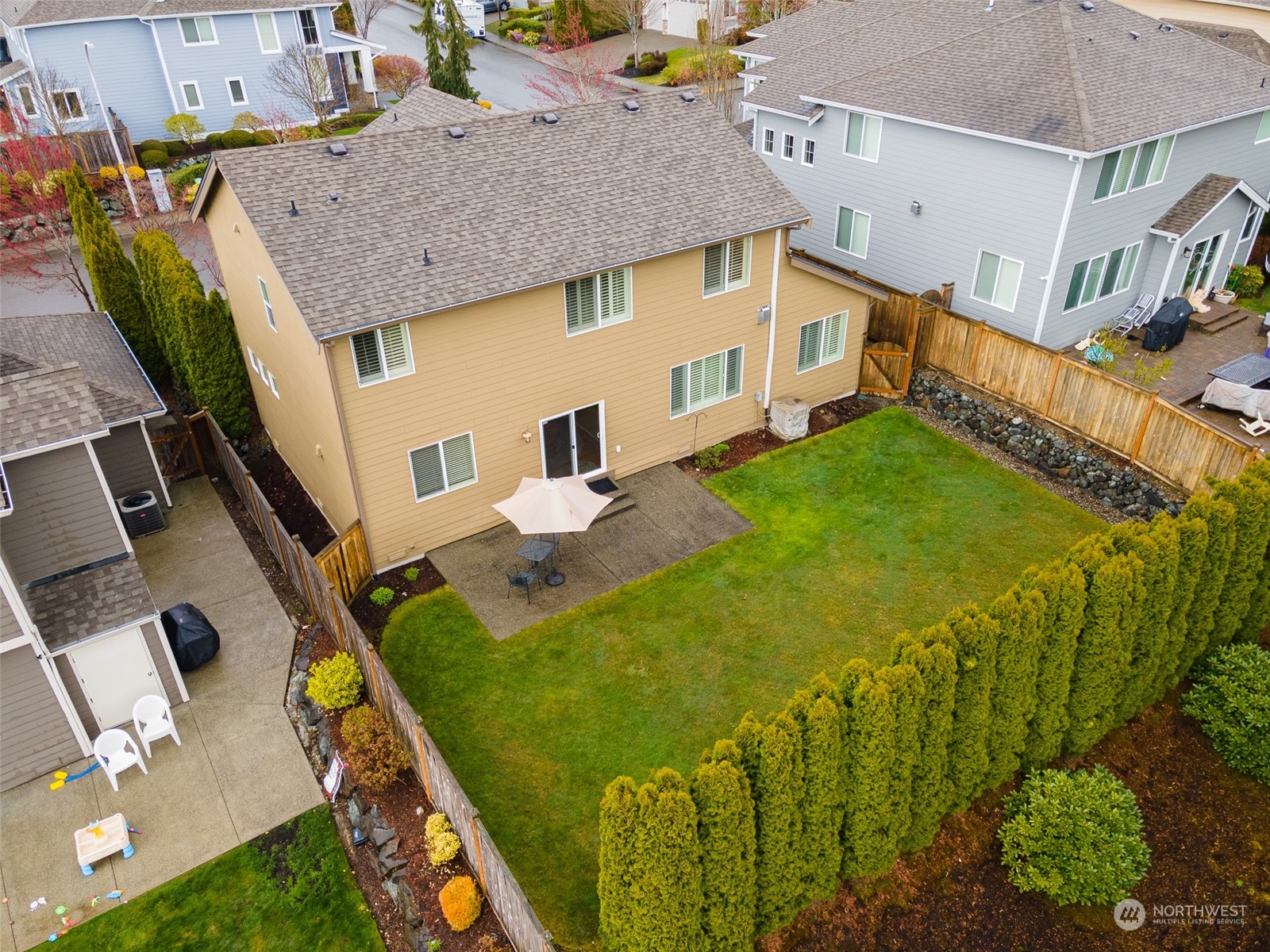 6127 Southeast 2nd Street Renton, WA 98059 - Photo 26 of 33 a aerial view of a house with table and chairs