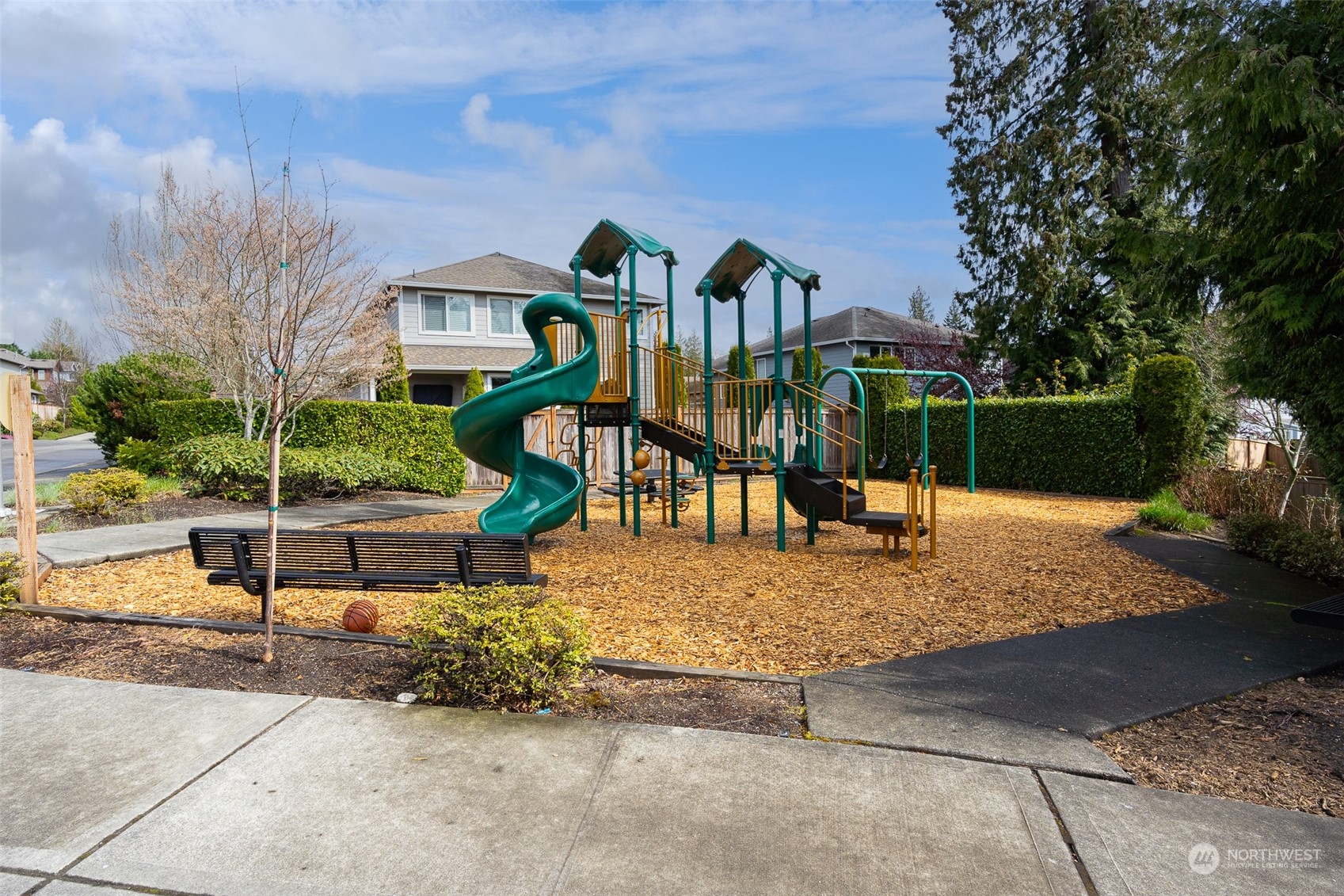 6127 Southeast 2nd Street Renton, WA 98059 - Photo 30 of 33 a view of a park with slide and bench