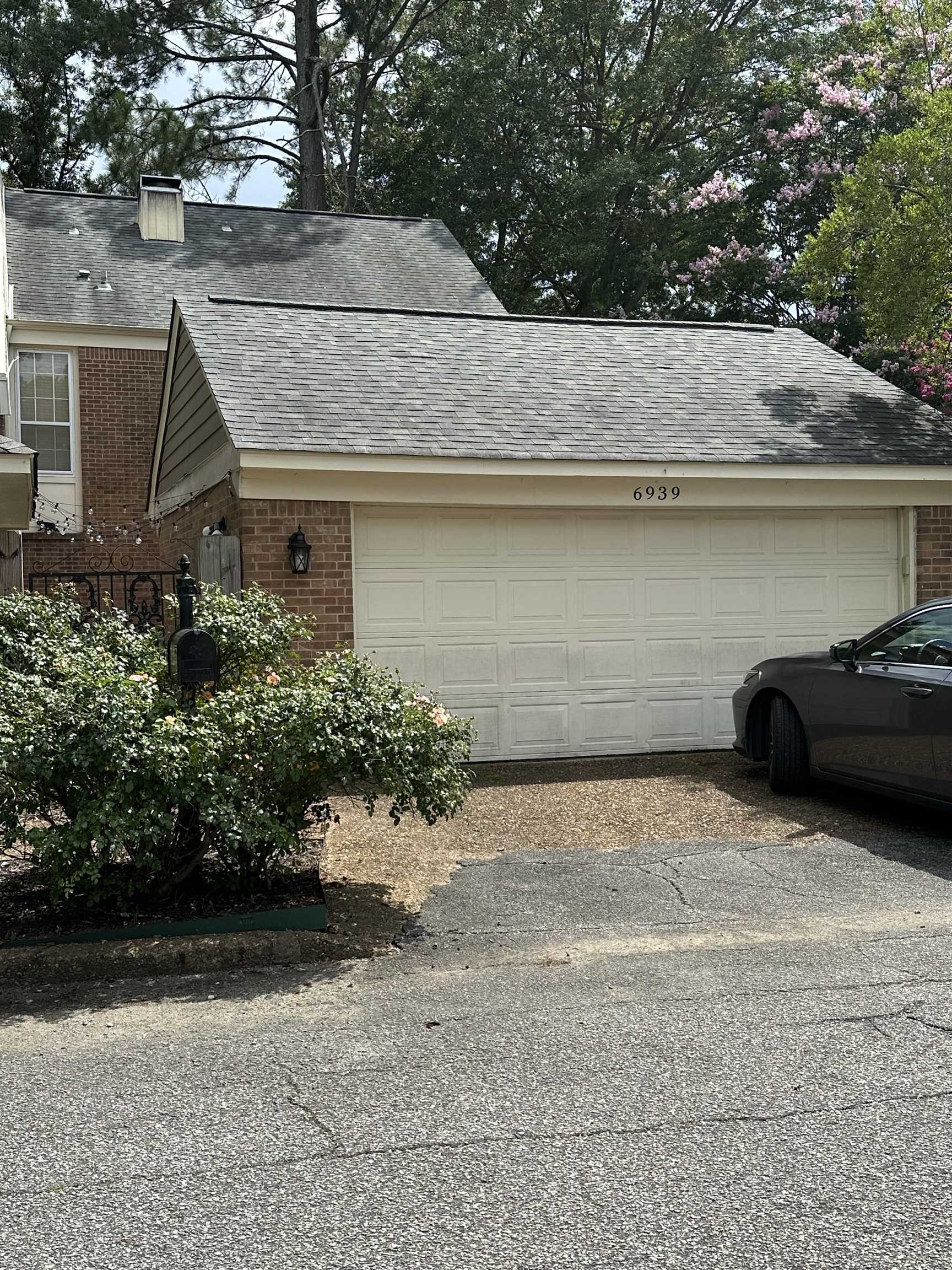Garage featuring driveway