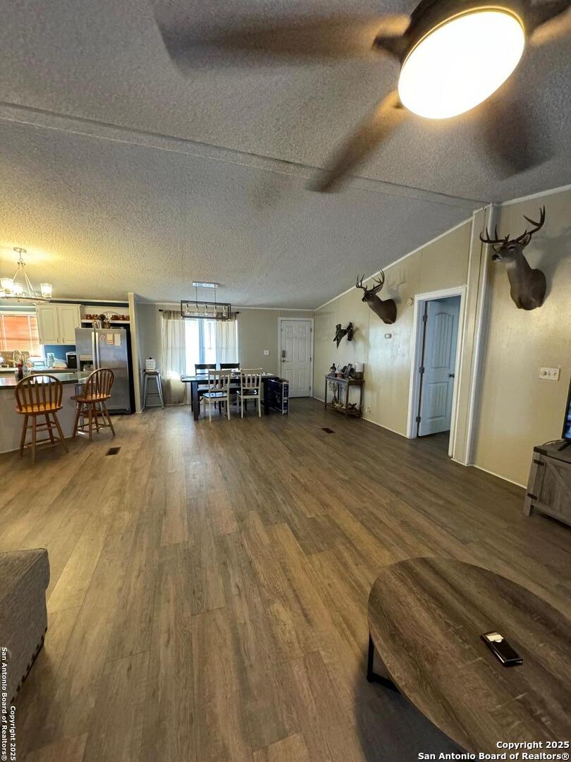 606 North Main Street Cotulla, TX 78014 - Photo 4 of 14 a room with lots of furniture and a mirror