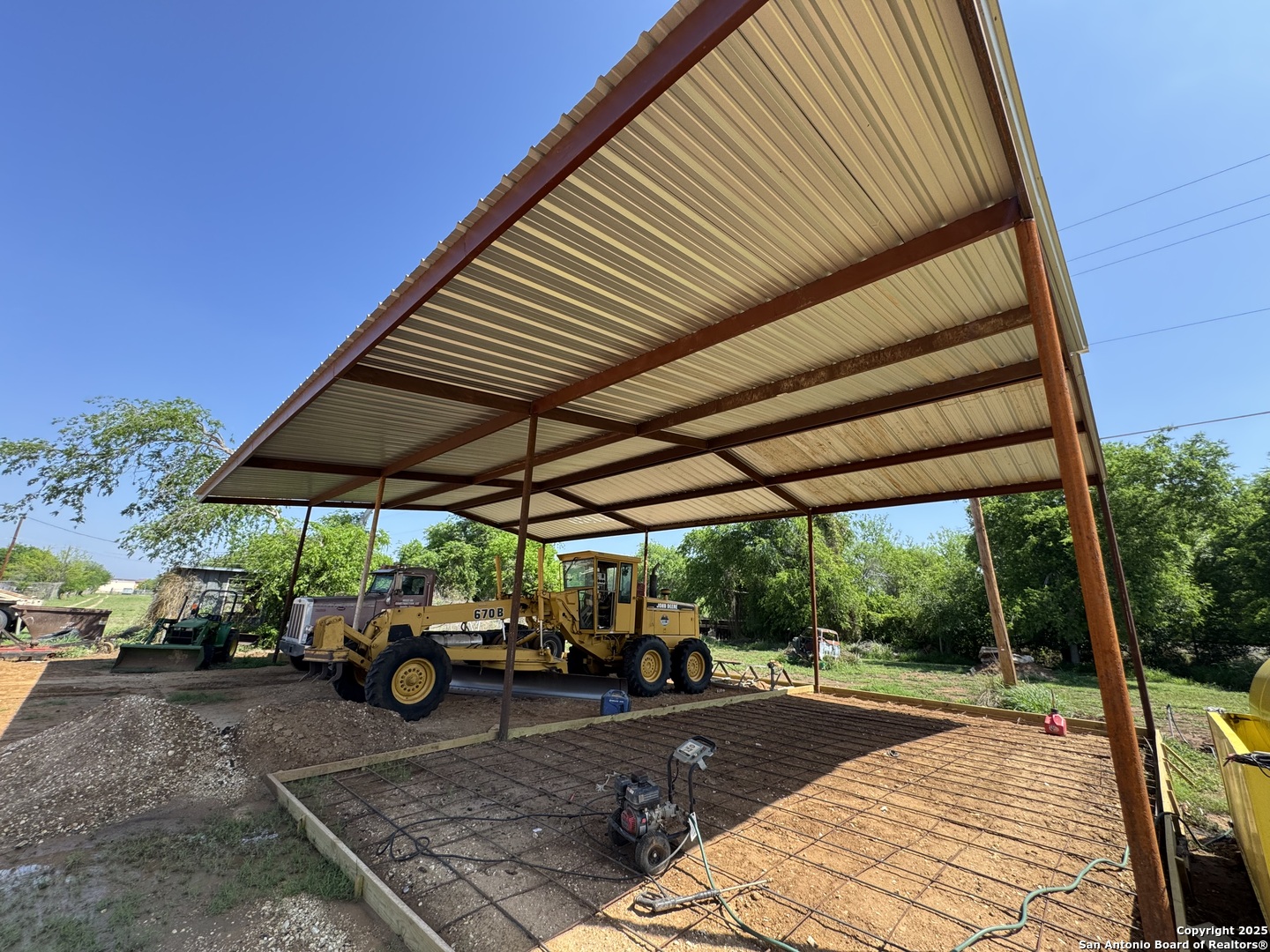 606 North Main Street Cotulla, TX 78014 - Photo 8 of 14 a view of a backyard with sitting area