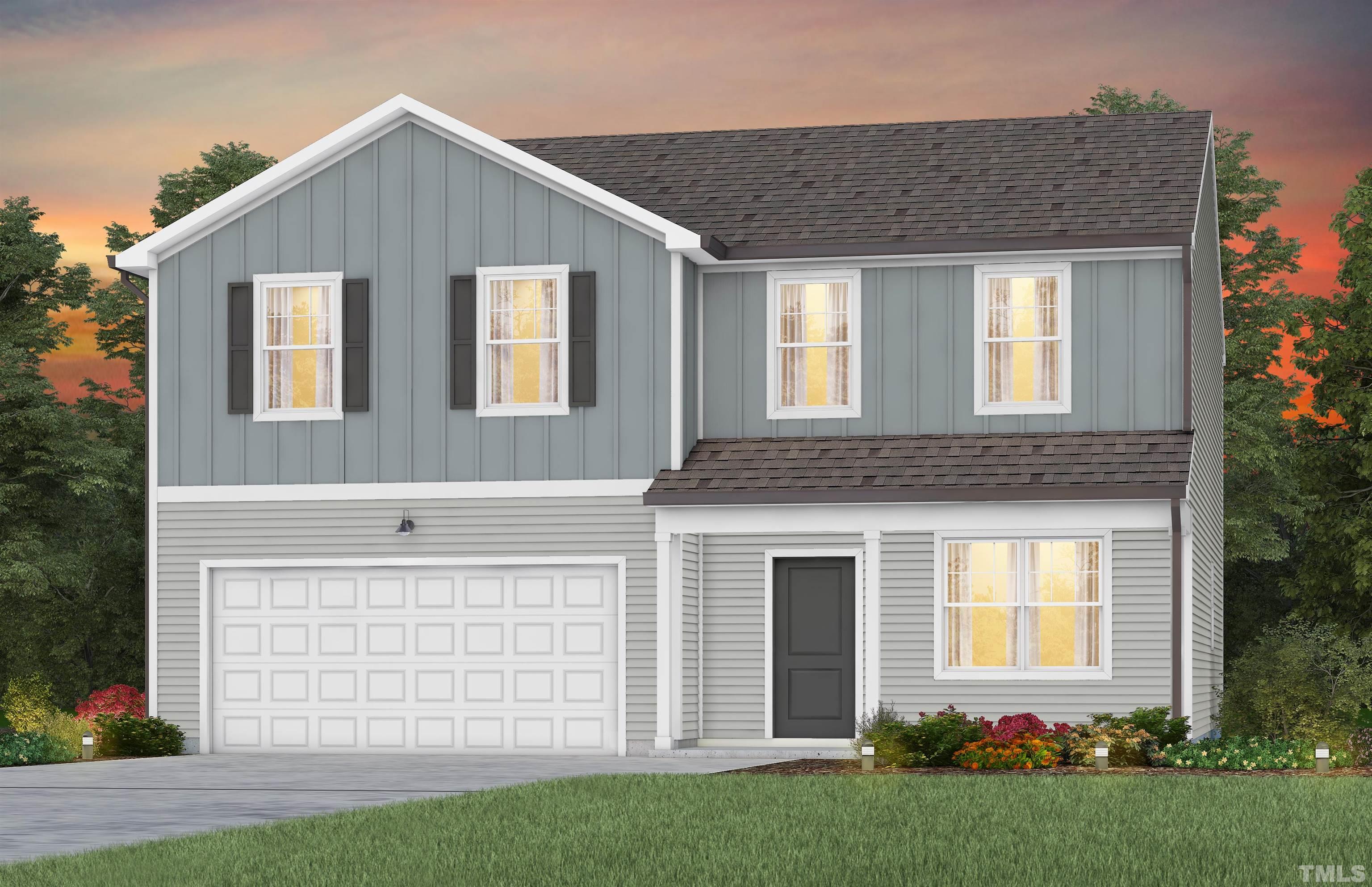 3524 Arctic Brook Street, Unit 540 Raleigh, NC 27604 - Photo 1 of 13 a front view of a house with garden