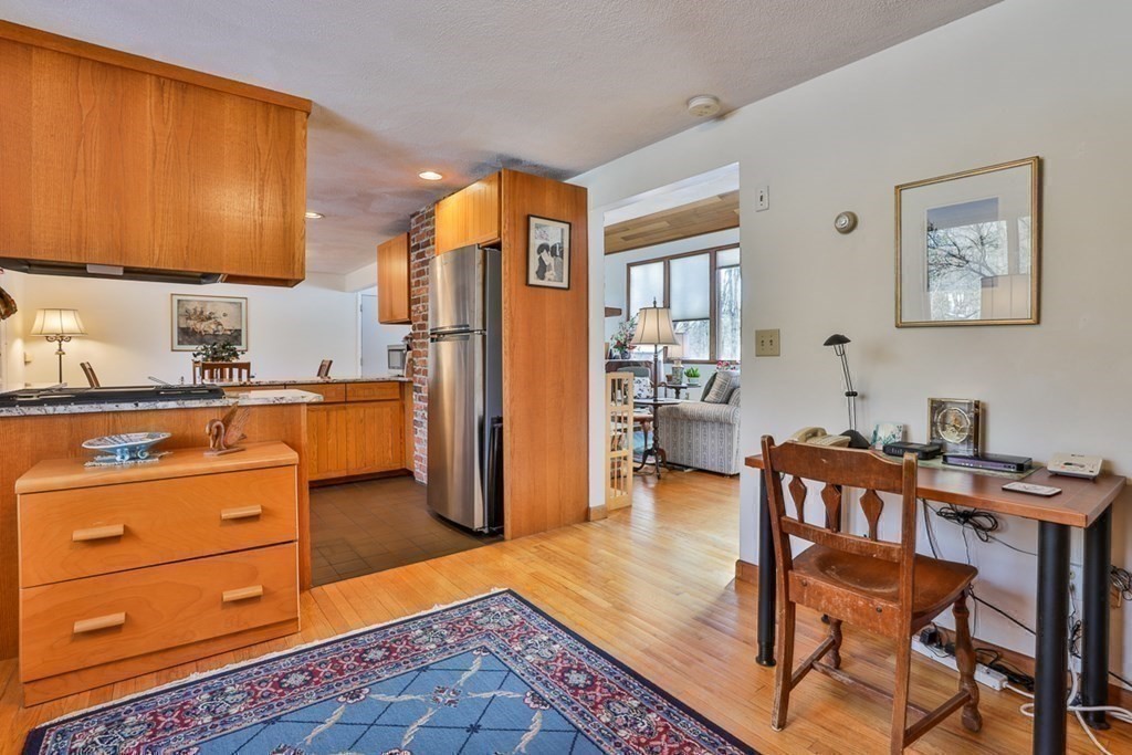 121 West Bare Hill Road Harvard, MA 01451 - Photo 15 of 36 a living room with furniture and a dresser