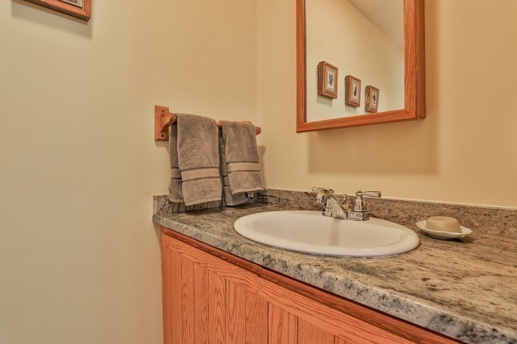 121 West Bare Hill Road Harvard, MA 01451 - Photo 18 of 36 a bathroom with a sink and a mirror