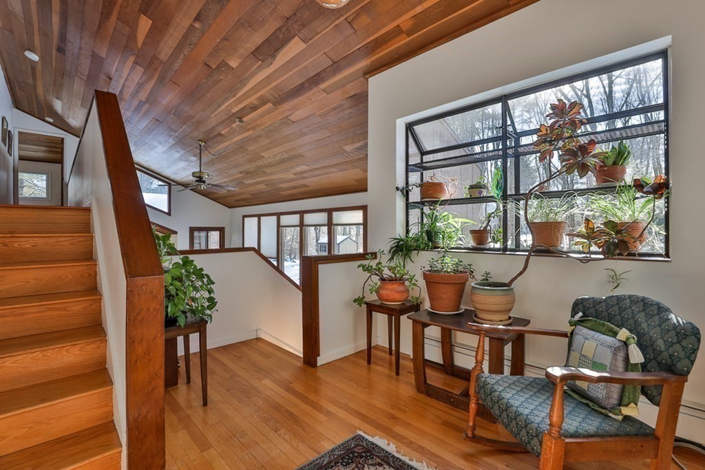 121 West Bare Hill Road Harvard, MA 01451 - Photo 19 of 36 a view of a dining room with furniture window and wooden floor