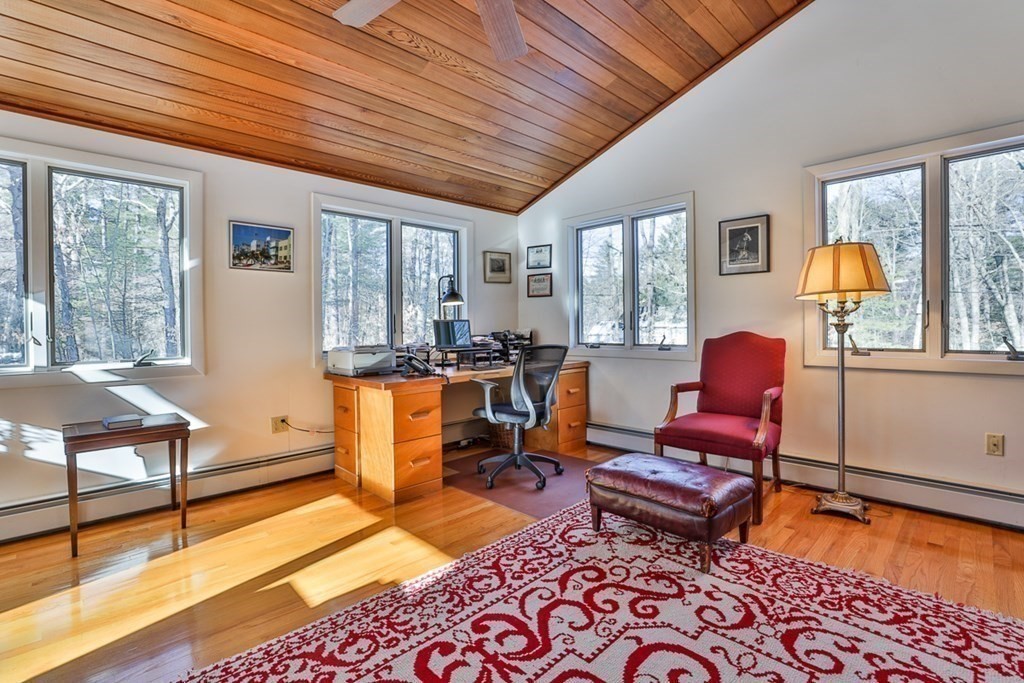 121 West Bare Hill Road Harvard, MA 01451 - Photo 23 of 36 a living room with furniture and a table