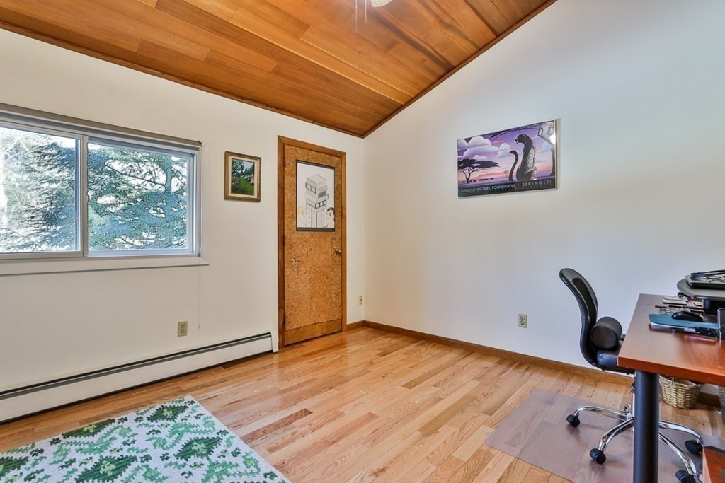 121 West Bare Hill Road Harvard, MA 01451 - Photo 28 of 36 a view of an empty room with wooden floor and a window