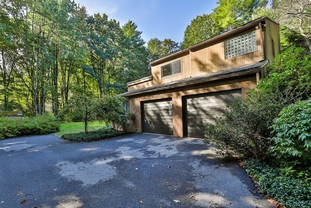 121 West Bare Hill Road Harvard, MA 01451 - Photo 32 of 36 a view of a house with a yard and large tree