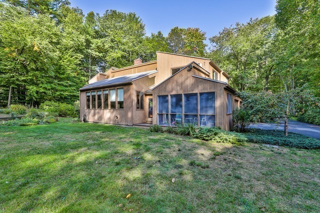 121 West Bare Hill Road Harvard, MA 01451 - Photo 33 of 36 a view of a house with a yard and sitting area