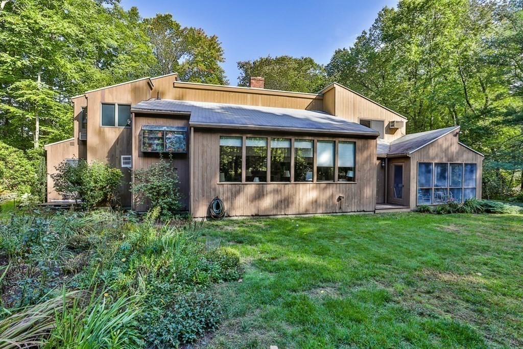 121 West Bare Hill Road Harvard, MA 01451 - Photo 36 of 36 a view of a house with backyard porch and garden