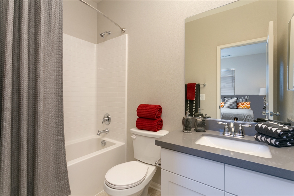 8850 Olive Lane, Unit 9 Santee, CA 92071 - Photo 14 of 17 This is the ensuite bathroom for the second bedroom complete with tub. This is a picture of the new furnished model.