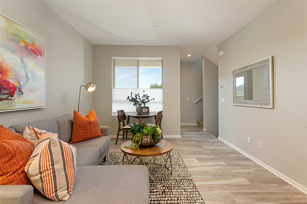 8850 Olive Lane, Unit 9 Santee, CA 92071 - Photo 5 of 17 The Great Room is located on the second level along with a bedroom, full bath and laundry room.This is a picture of the new furnished model.