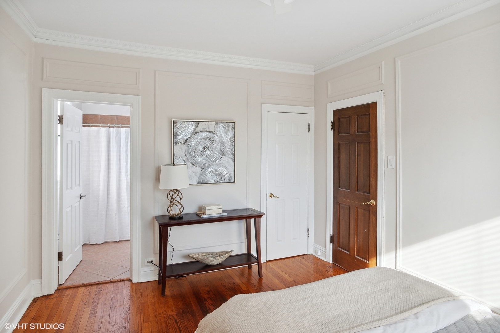 559 West Roscoe Street, Unit 2W Chicago, IL 60657 - Photo 13 of 23 a bedroom with furniture and a window