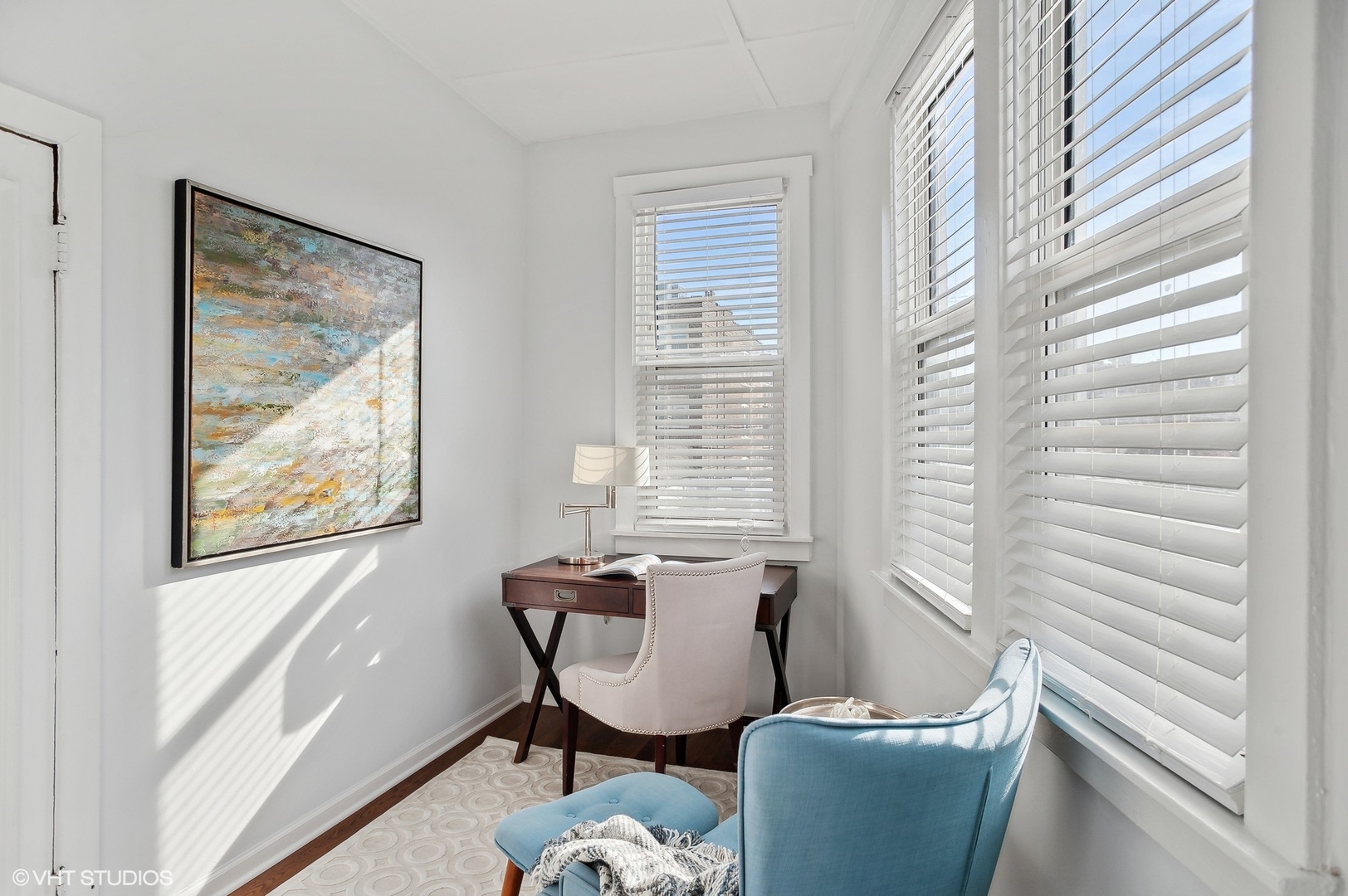 559 West Roscoe Street, Unit 2W Chicago, IL 60657 - Photo 21 of 23 a living room with furniture and a window
