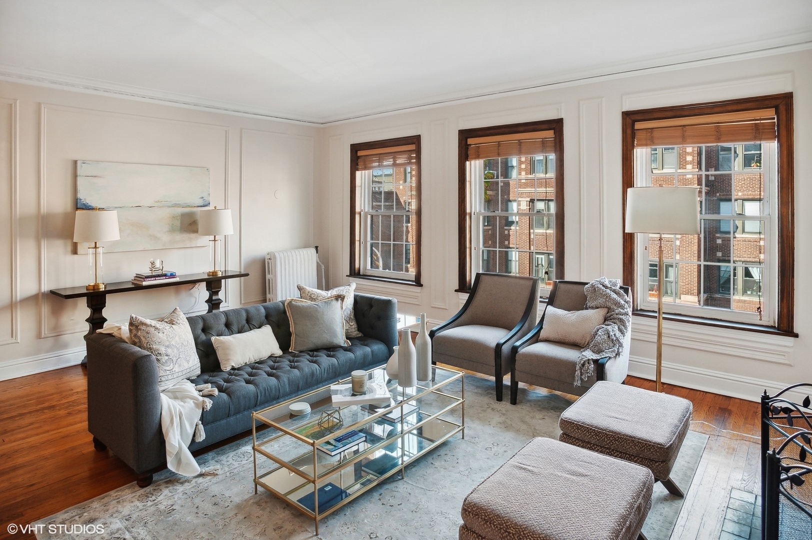 559 West Roscoe Street, Unit 2W Chicago, IL 60657 - Photo 3 of 23 a living room with furniture and a large window