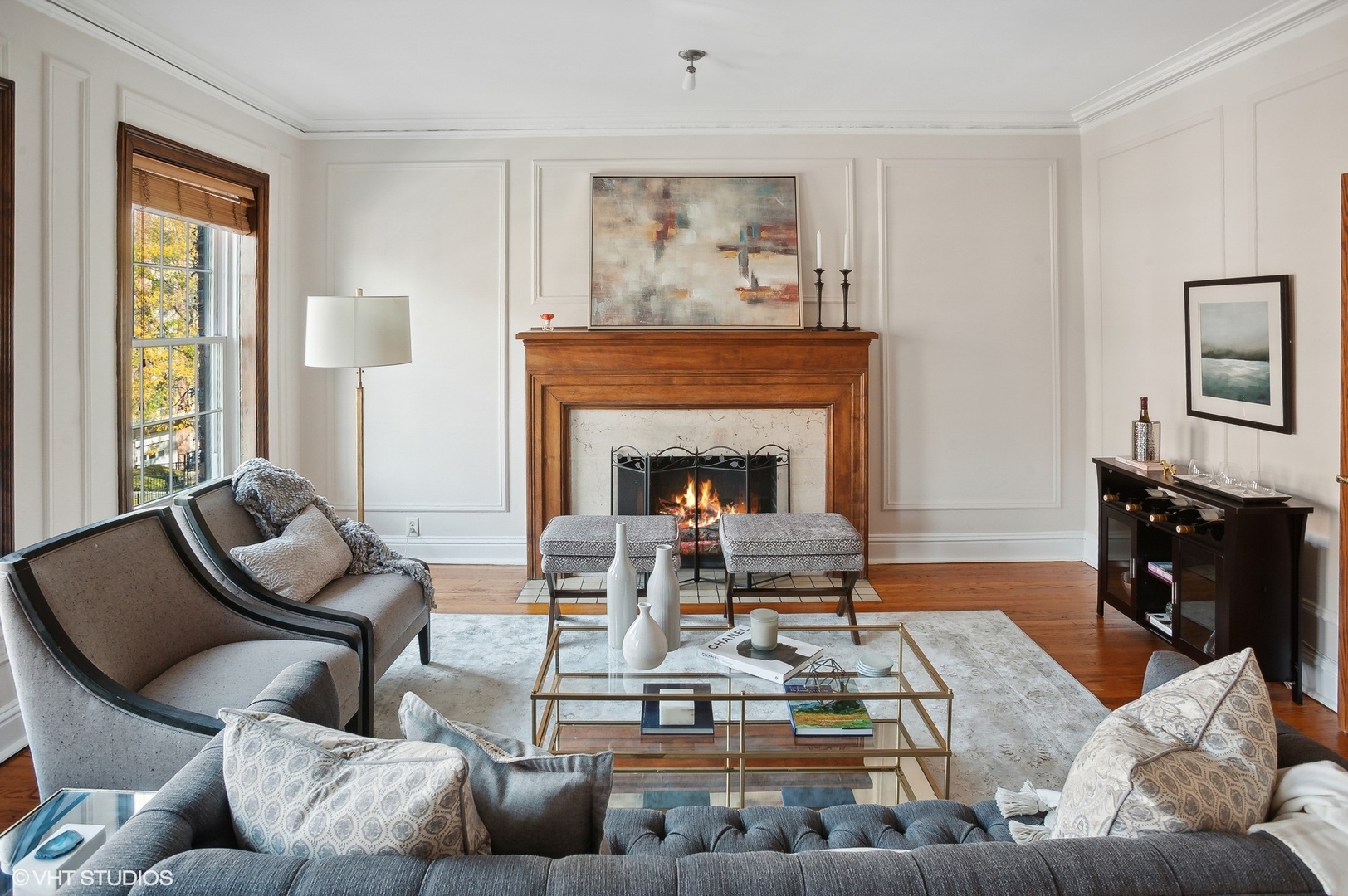 559 West Roscoe Street, Unit 2W Chicago, IL 60657 - Photo 5 of 23 a living room with furniture and a fireplace