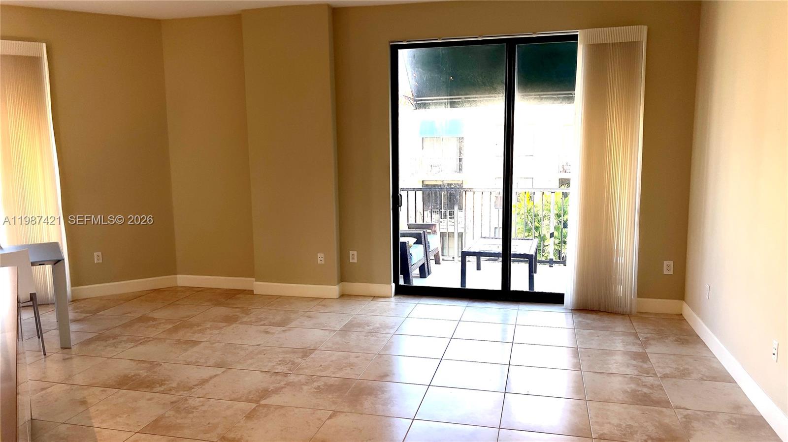 55 Merrick Way, Unit 825 Coral Gables, FL 33134 - Photo 20 of 26 a view of an empty room with a window