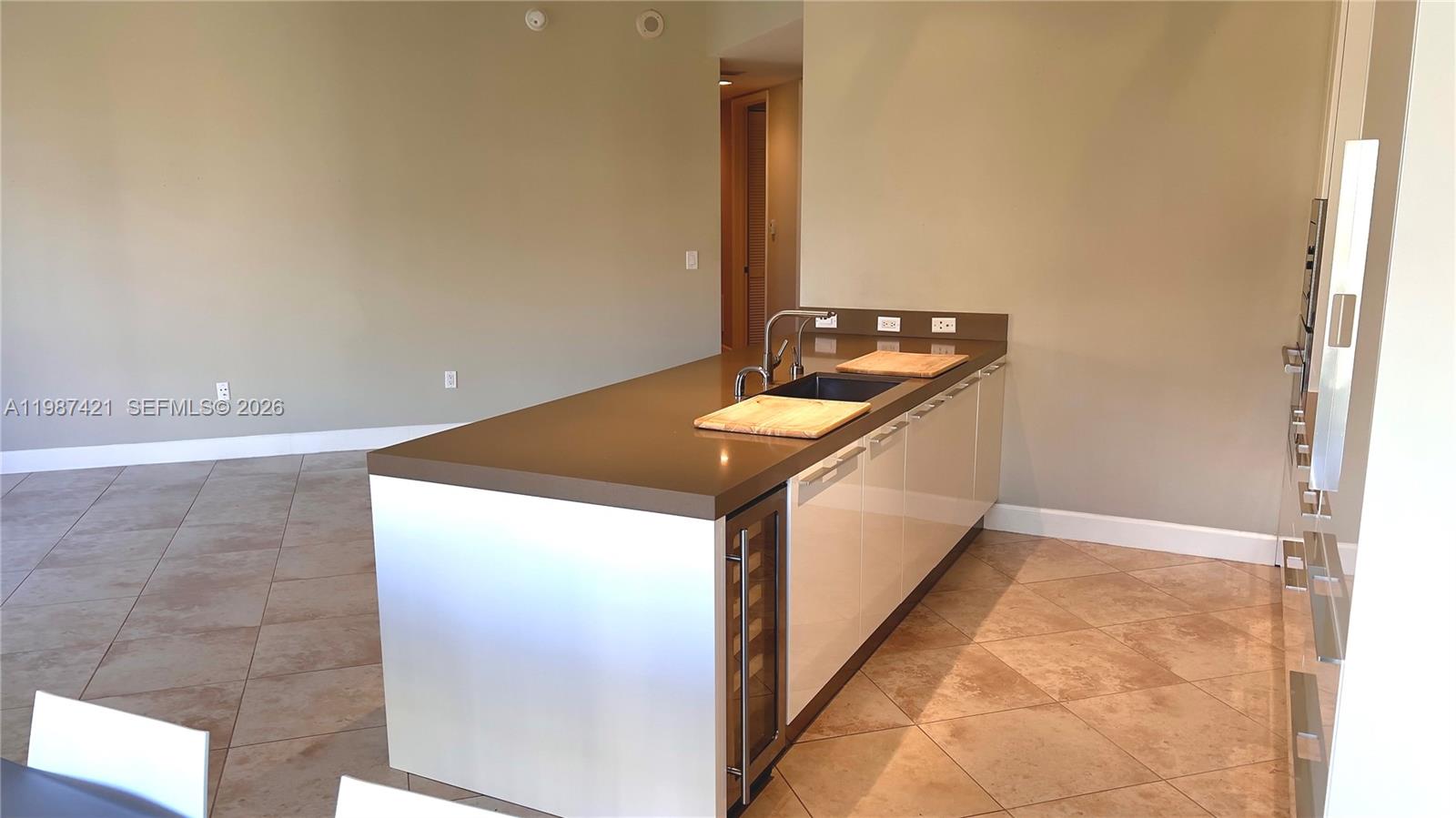 55 Merrick Way, Unit 825 Coral Gables, FL 33134 - Photo 22 of 26 a bathroom with a sink and a mirror