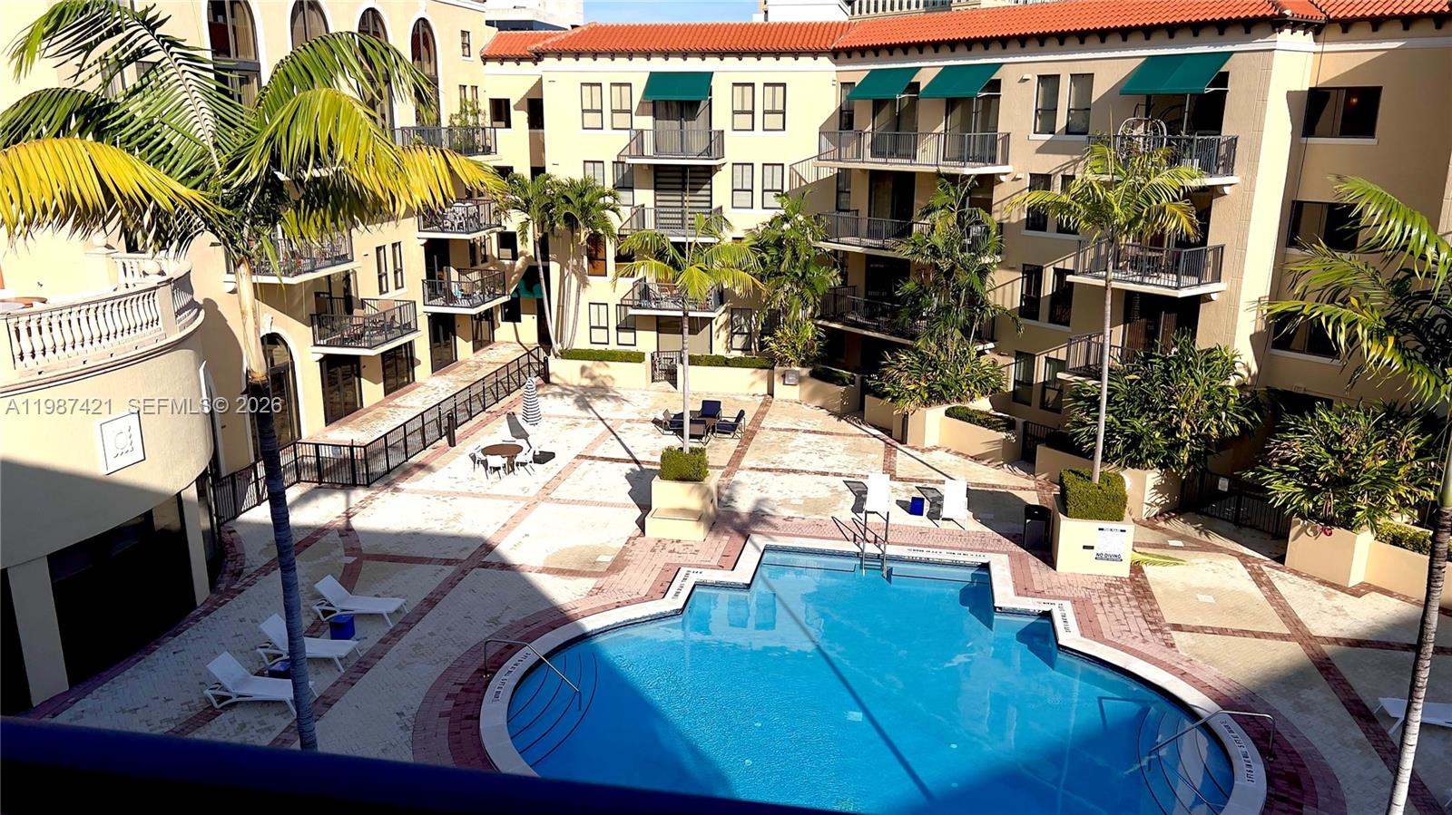 55 Merrick Way, Unit 825 Coral Gables, FL 33134 - Photo 26 of 26 a view of outdoor space yard and porch
