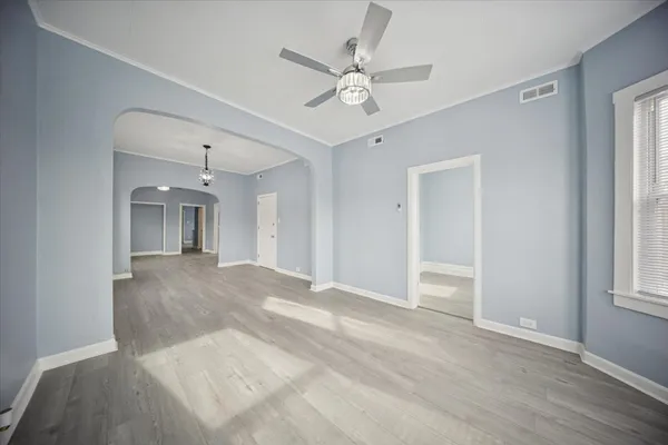 a view of an empty room with a window