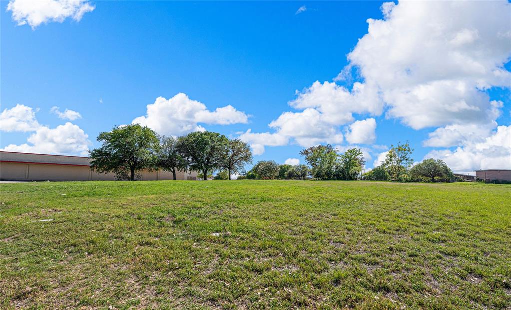 720 North New Road Waco, TX 76710 - Photo 34 of 39 a view of a big yard with an outdoor space and seating