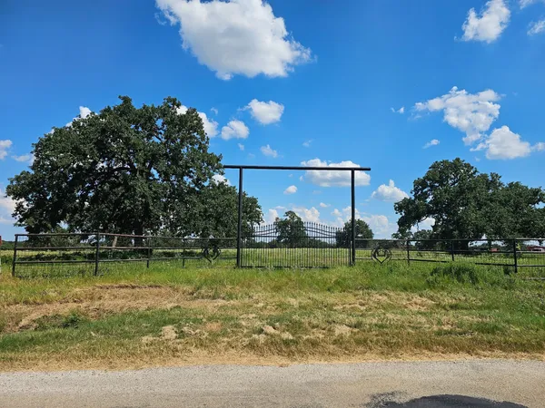 a view of a lake with a big yard