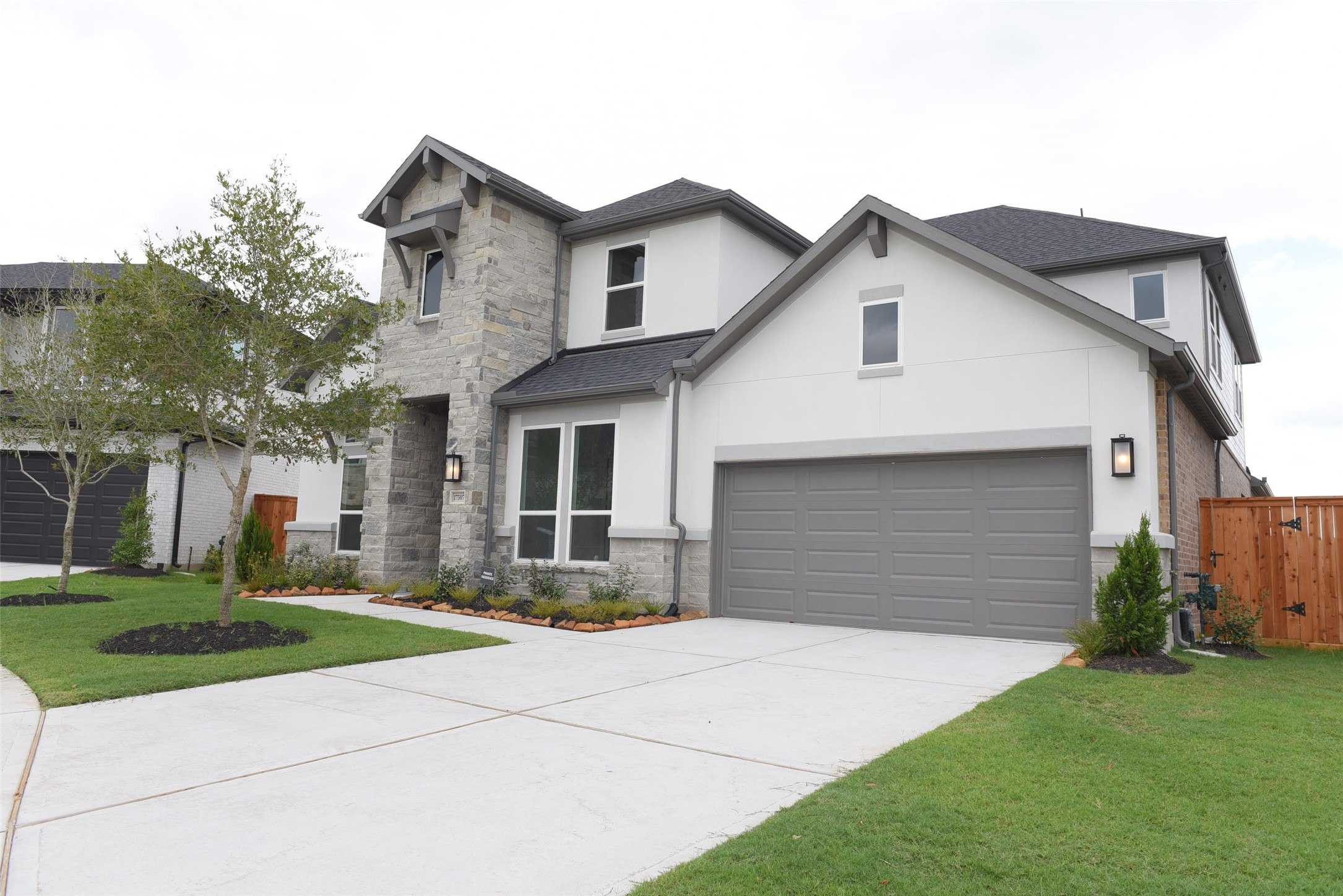 17507 Tulip Mdw Road Richmond, TX 77407 - Photo 1 of 47 a front view of house with yard and green space