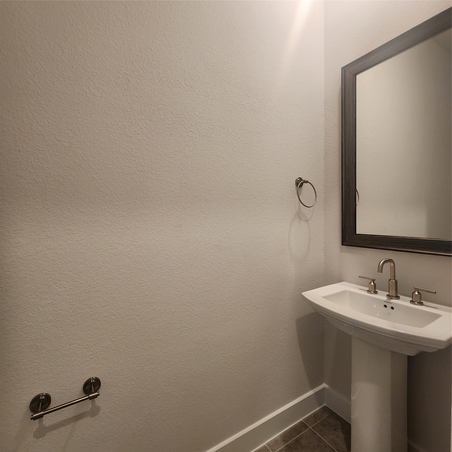 17507 Tulip Mdw Road Richmond, TX 77407 - Photo 16 of 47 a bathroom with a sink and a mirror