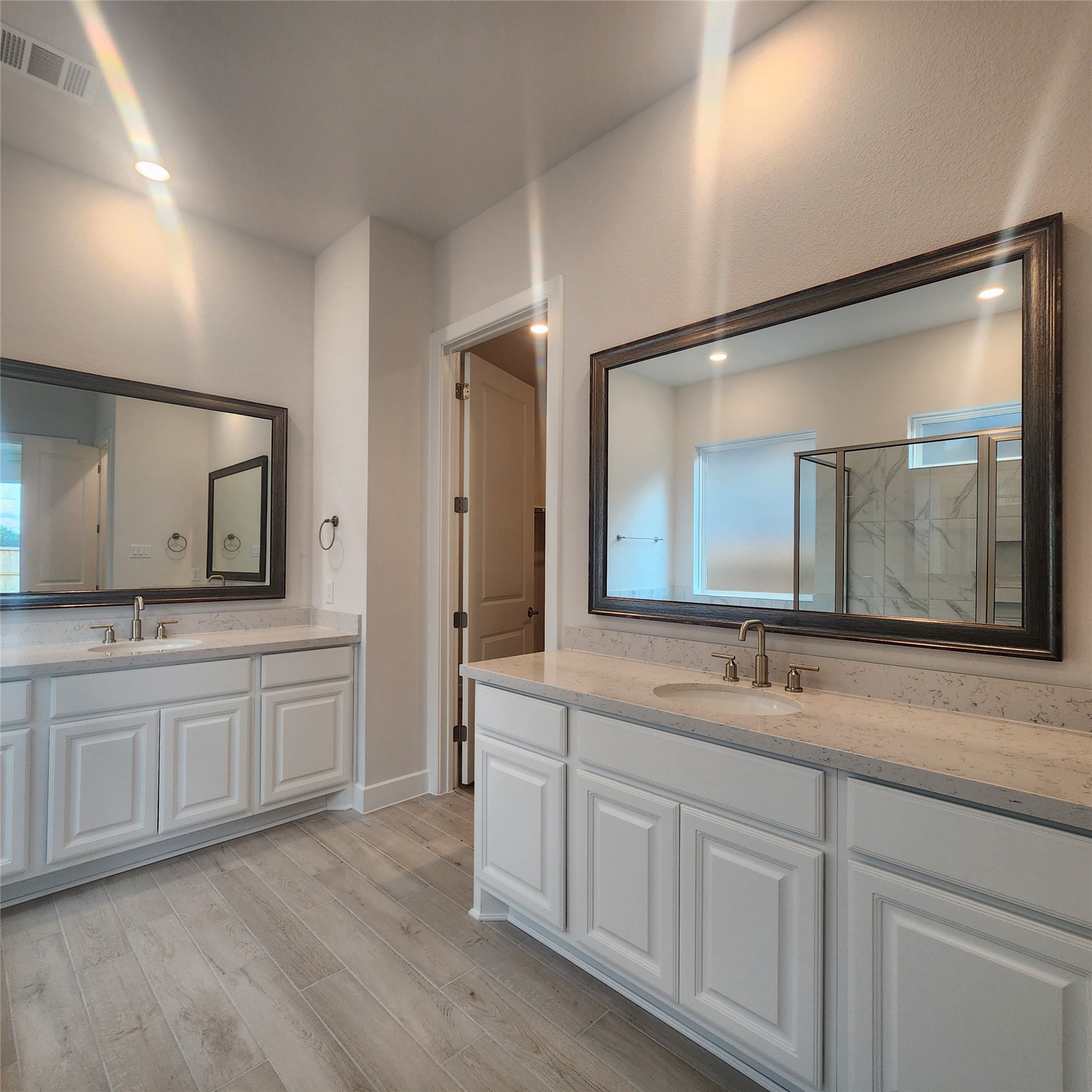 17507 Tulip Mdw Road Richmond, TX 77407 - Photo 21 of 47 a bathroom with a granite countertop double vanity sink and mirror