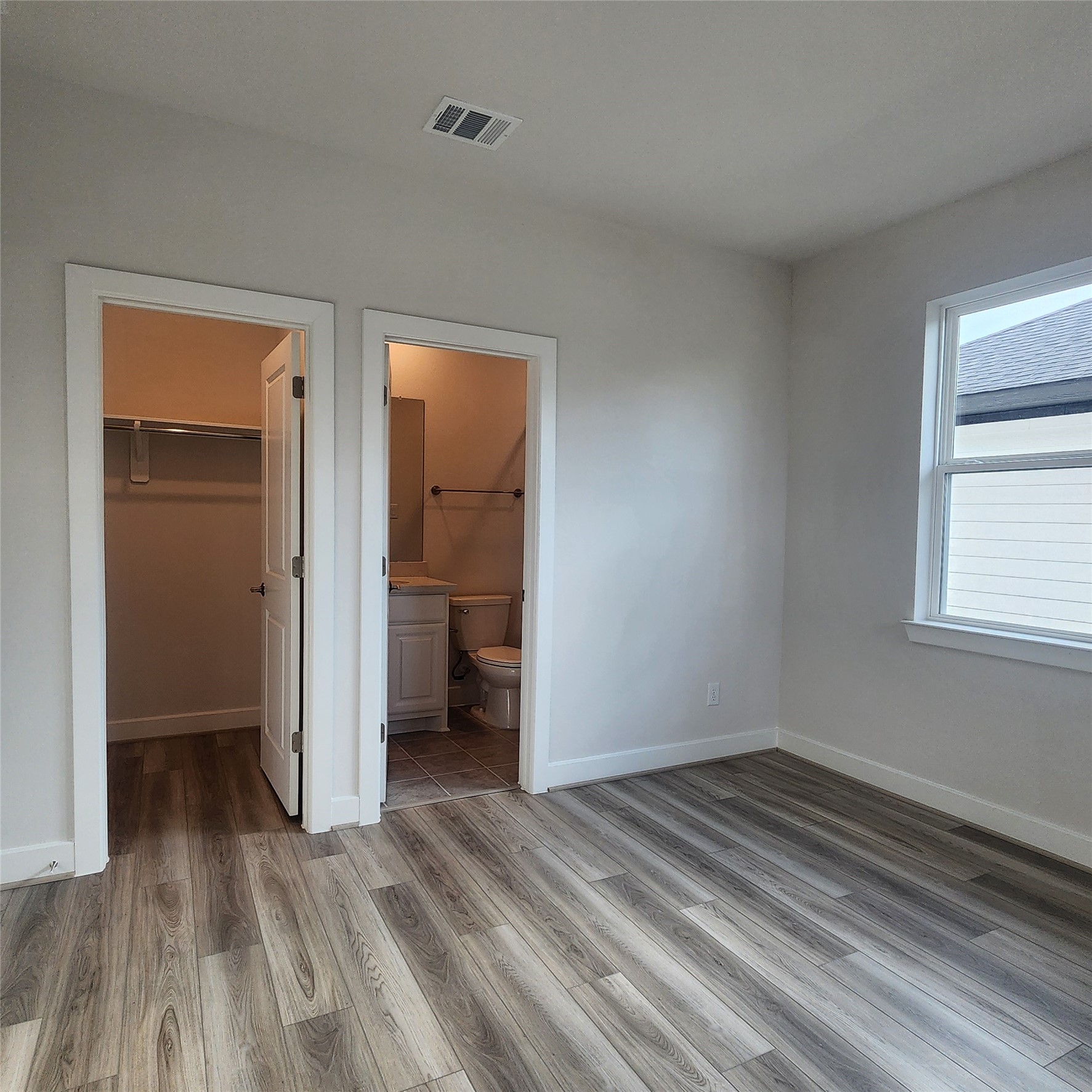 17507 Tulip Mdw Road Richmond, TX 77407 - Photo 29 of 47 a view of a room that has a bed and a window